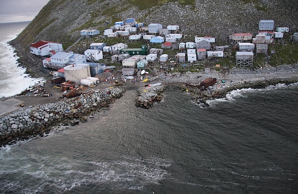 a small town on a rocky shore